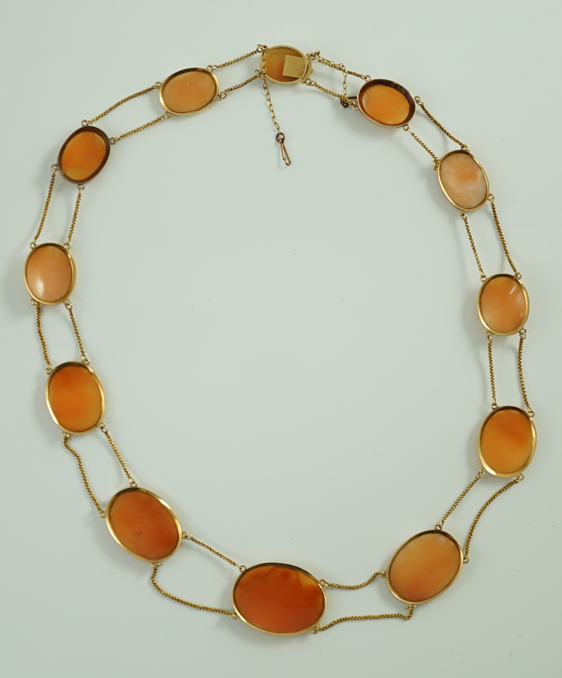 A late Victorian gold and graduated oval cameo shell necklace